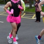Paul Berresford running to the finsh line at the Ashgate Hospice Drag Race