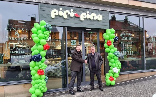 Corporate Solicitor Matthew Lilley and Business Owner Mike Brown Shaking Hands Outside Piri Fino On Ecclesall Road, Sheffield